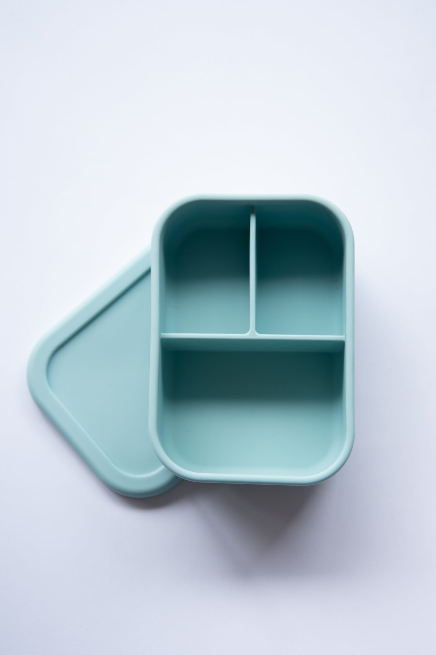 Light blue food grade silicone bento lunch box with three compartments