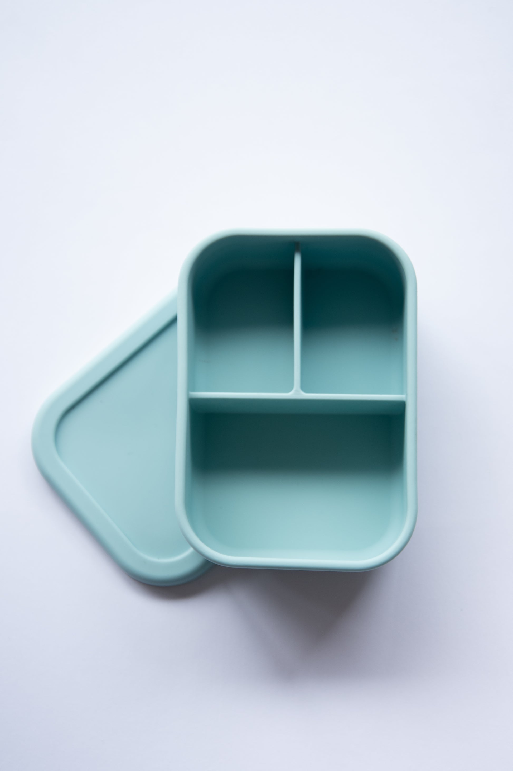 Light blue food grade silicone bento lunch box with three compartments